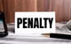 penalty note sitting on desk
