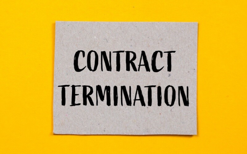 sign that reads contract termination
