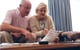 older couple reviewing paperwork