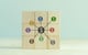 group of wooden blocks with dollar signs on them