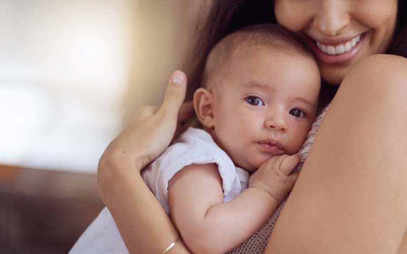 woman holding a baby