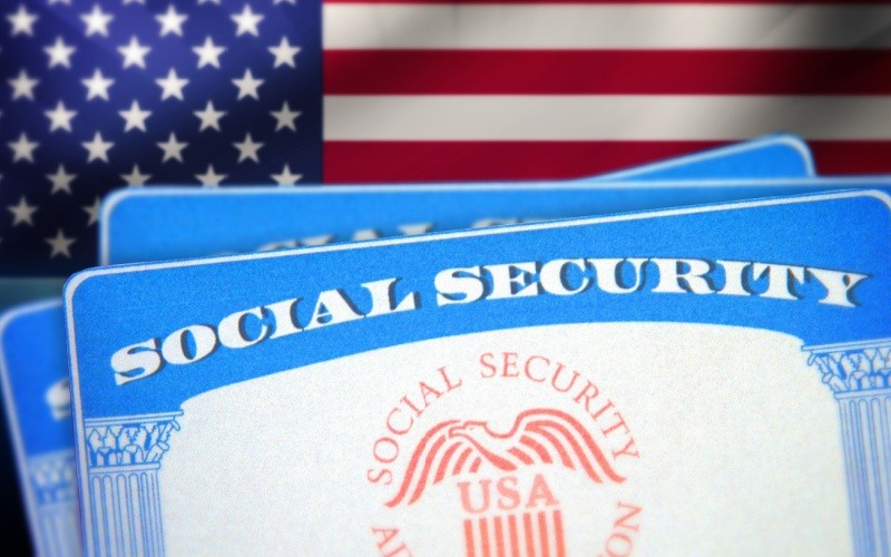 social security card in front of American flag