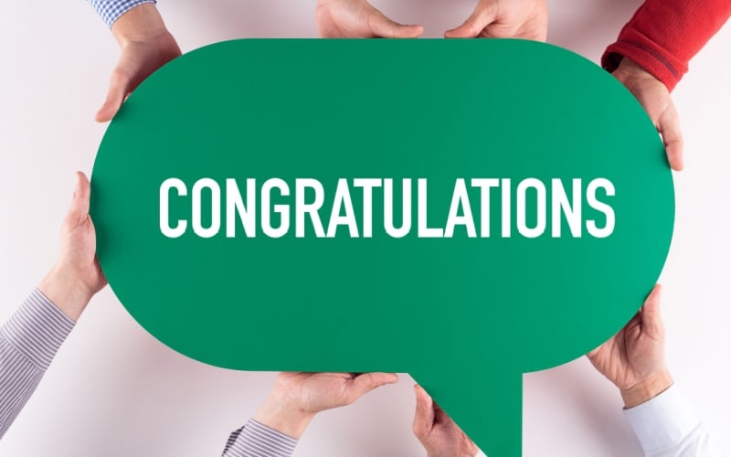 words congrats in bubble with hands