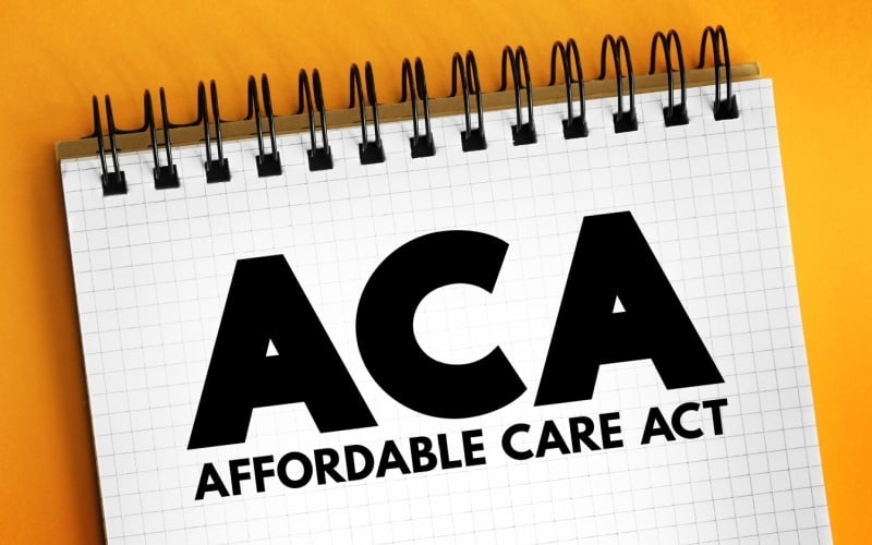 Affordable Care Act written in a notebook