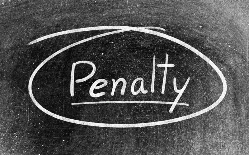 penalty written on chalkboard