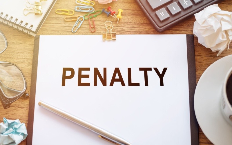 penalty written on paper on desk