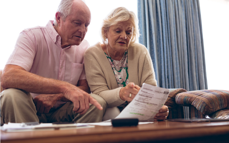 older couple reviewing paperwork