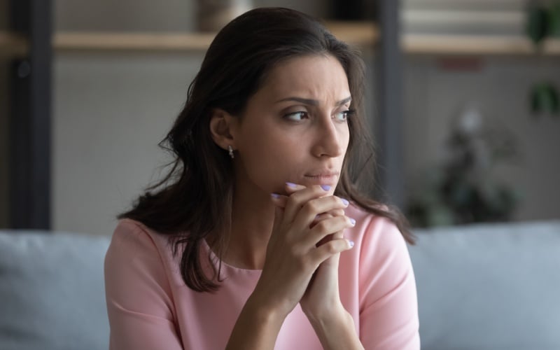 woman looking worried