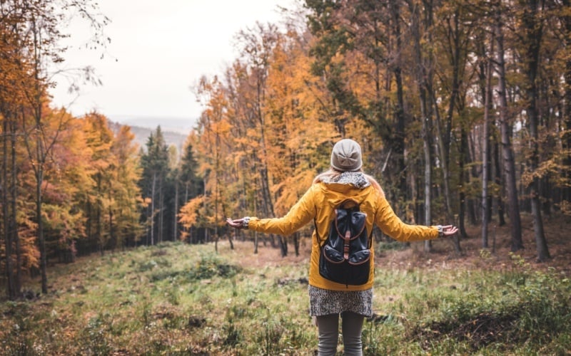 woman hiking in fall