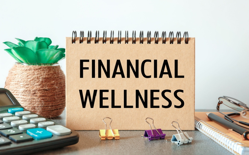 financial wellness written on notebook