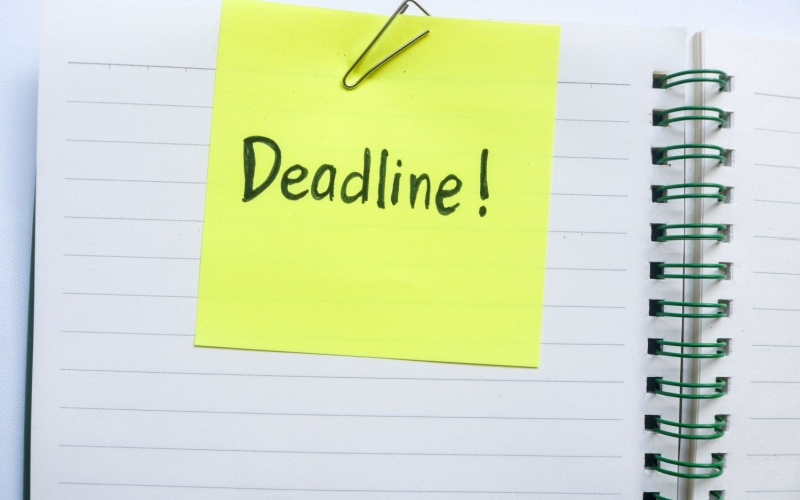 deadline written on post it note