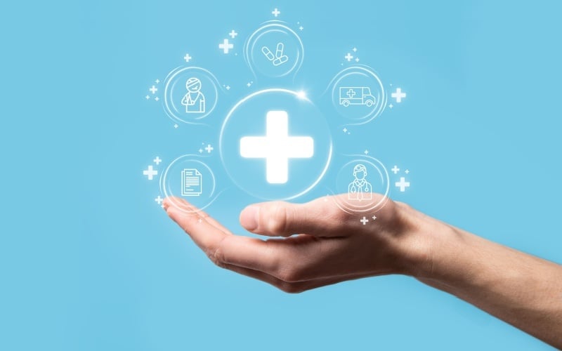 hand holding medical icons