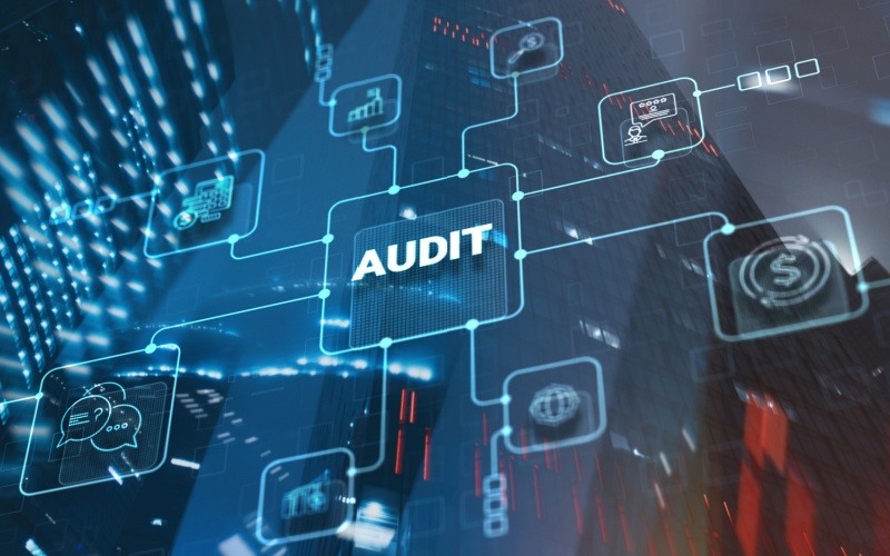 audit icons on city background