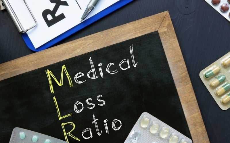 medical loss ratio written on a chalkboard