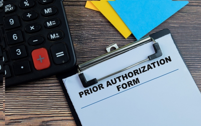 prior authorization form sitting on desk