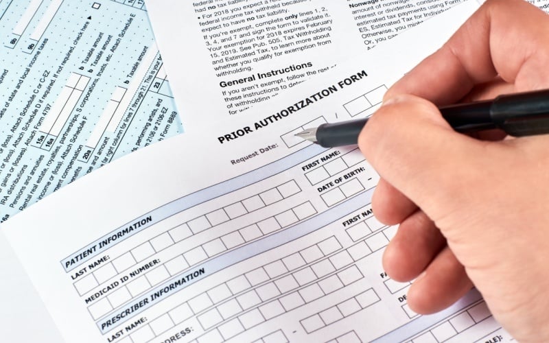 person completing paperwork