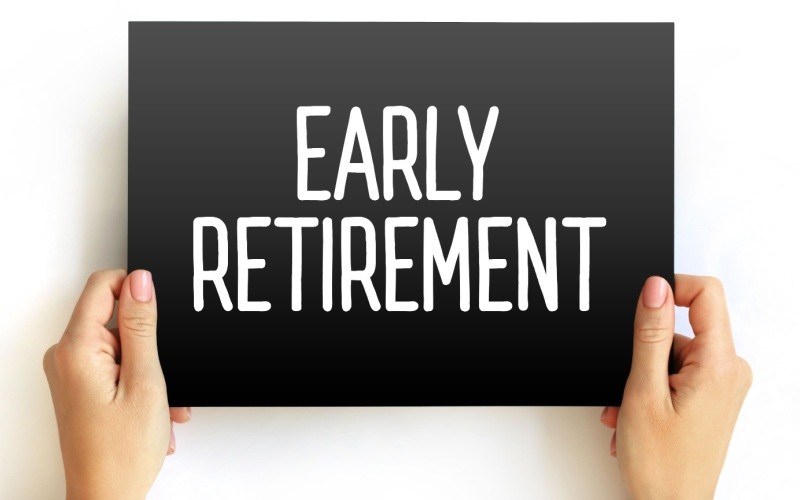 woman holding up sign that reads early retirement